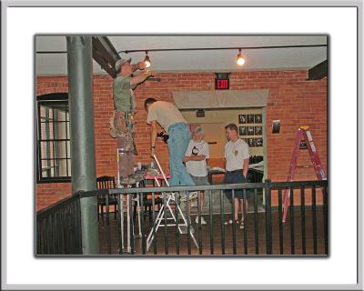 Stilts make the work go faster - Patrick is the supervisor!