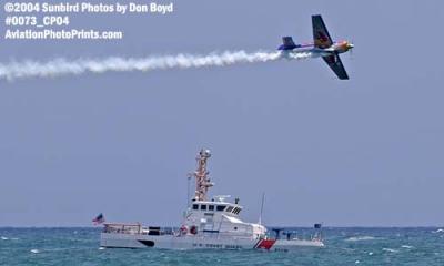 2004 - Red Bull aerobatic aircraft and CGC BLUEFIN (WPB 87318) at the Air & Sea Show - Coast Guard aviation stock photo #0073
