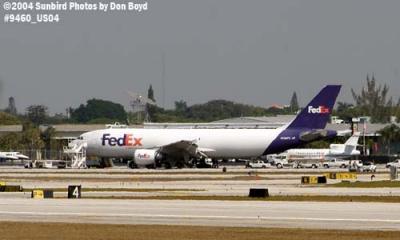 FedEx A300 on 27-right with blown main gear tires - aviation stock photo #9460
