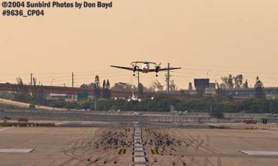 Continental Connection (Gulfstream Int'l) B-1900D takeoff with Citation landing aviation stock photo #9636