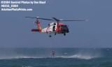 2004 - Coast Guard HH-60J Jayhawk hoist operation at the Air & Sea Show - Coast Guard and aviation stock photo #0215