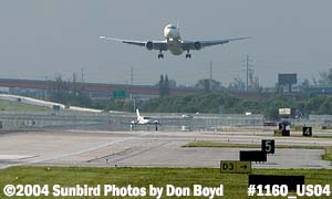Air Sunshine C-402C N402RS landing and Delta B767-432ER N927MH doing a go-around aviation airline stock photo #1160