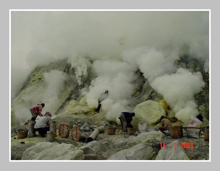 Miner waiting to load in thick pungent smoke