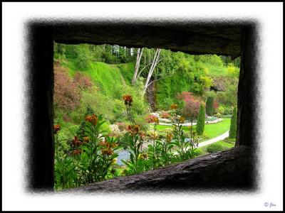 another window looking out at gardens