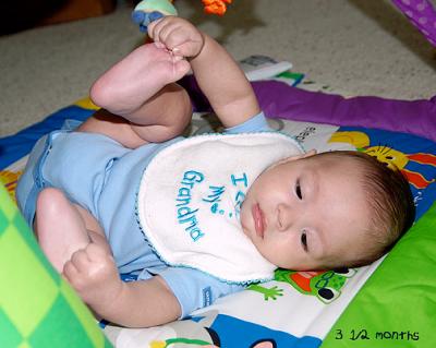 16-wks-Grabbing-feet.jpg