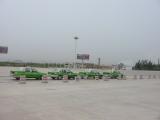 Bustling Kashgar airport parking lot.jpg