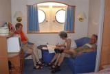 DSC01228 - Vicki writing up the trip log in their stateroom