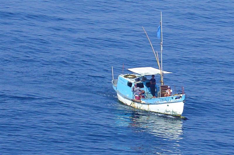 DSC01650 - Fishing boat off Manzanillo. The ship may have accidentally hooked his nets...