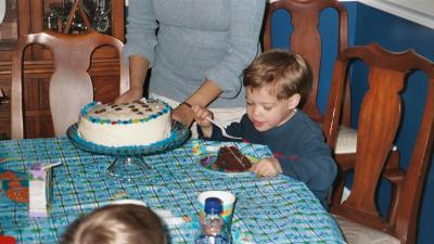 Ben eating his cake on his 3rd birthday