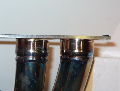 Popping on Deceleration??? --Check the Header Pipe and make sure tha flange is welded straight
