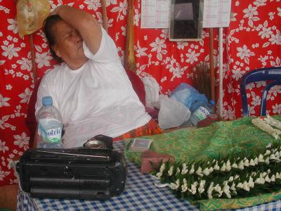 sleeping vendor, flower market, Papeete
