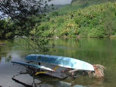 outrigger canoe, docked in the river near Lake Fauna Nui