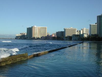 From the east end of Waikiki Beach, looking across a breakwater at some of the hotels lining the strip