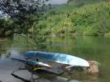 outrigger canoe, docked in the river near Lake Fauna Nui