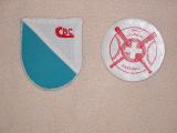 On the left the first team logo, Mrs.Zingg made on her sowing machine. On the right the federations 1986 championship patch.JPG