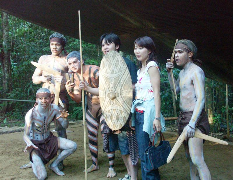 Aboriginal dancers and Japanese tourists