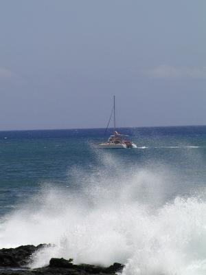 Catamaran heading out from Port Allen