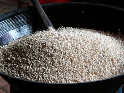 Tapioca & molasses are added to the popped rice