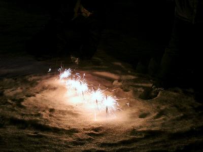 Sparklers in the snow  by Alexander McClearn