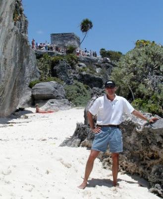 Phil with the cliffs and ruins of Tulum in the background