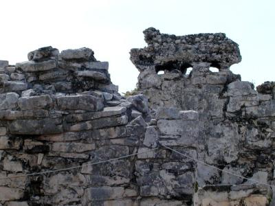 Detail from Structure 34 showing holes where wooden beams once were