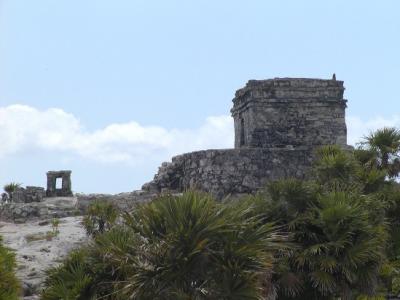 Structure 45 with, to the left, stone used to align the sun to time sacred rituals
