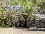 Gate in the north wall opening onto the Maya road to Cancun