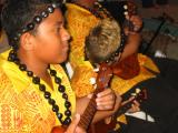 Kids playing Hawaiian music