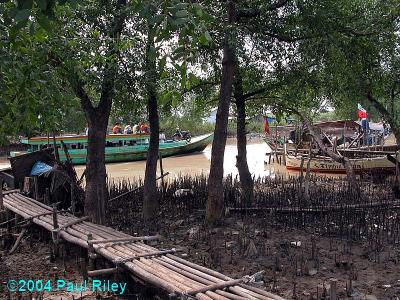 Fishing village on the north coast of Java - note the motorbike on the boat