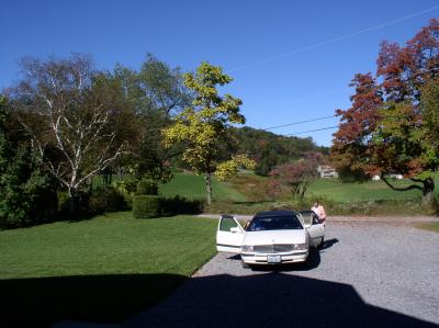 View of our car and front yard of Larry and Rebecca Waltz's home