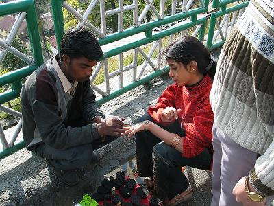 Newlywed getting henna done