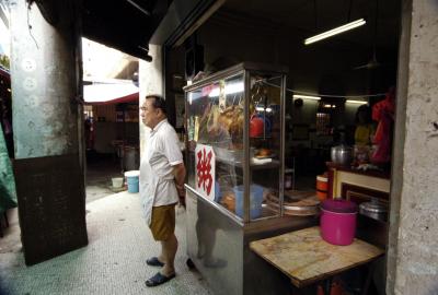 Waiter at the Chicken Stall