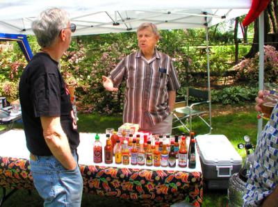 Checking out Rick and Christine's hot sauces