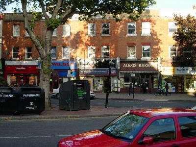 Our flat, from across the road. We're above the newsagents, right to the left of the bakery.