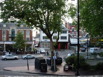 A view straight out my window. There's usually a red double-decker bus there.