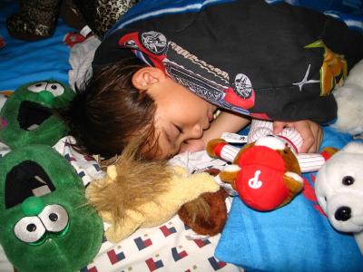 Son asleep after a hard day of school(vivid photo setting)