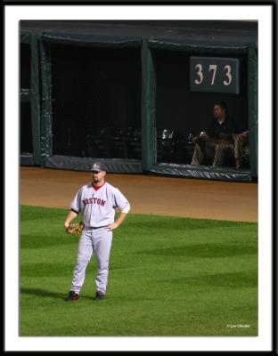 Red Sox dirt dog and right fielder, Trot Nixon, patrols deep right field.