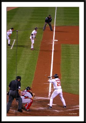 Rafael Palmiero tries to bring in the runner from third with less than two out against the Sox.