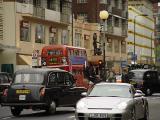 English cab vs. German Porsche