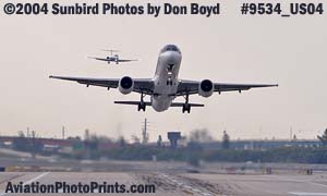 Northwest Airlines B757 and Spirit MD-82 N812NK airline aviation stock photo #9534