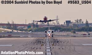 Delta Connection (Chautauqua Airlines) EMB-135 and Southwest Airlines B737 go-around sequence #3 - aviation stock photo #9583