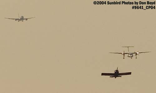 One takeoff and two approaches aviation stock photo #9641