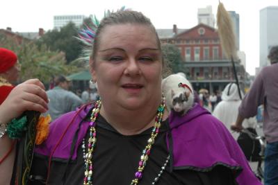 Yes, that is a live rat on her shoulder