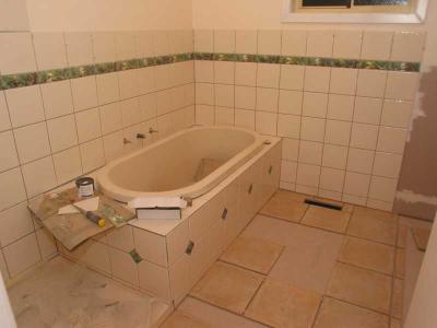 extra row of tiles on the walls