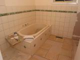 extra row of tiles on the walls