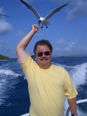 Dad Feeds the Gulls on the Stormy Petrel