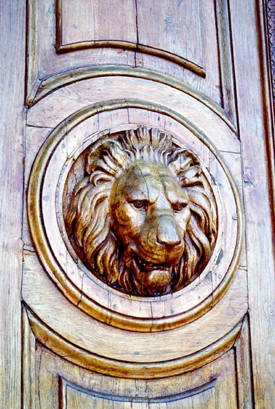 Carved lion door