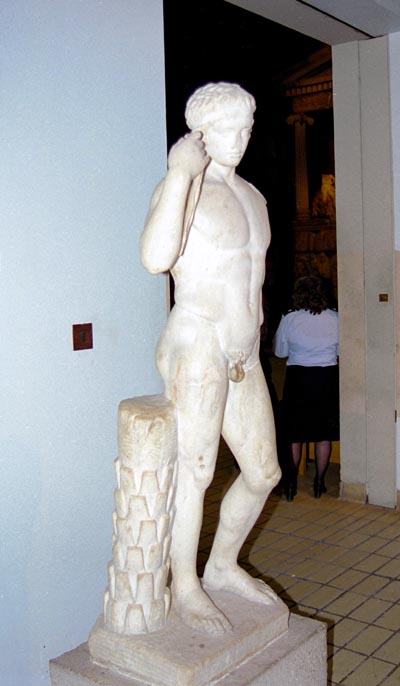 Marble statue of an athlete tying a ribbon around his head, 1st C. AD Roman copy of Greek original ca440 BC (Farnese Diadoumenos