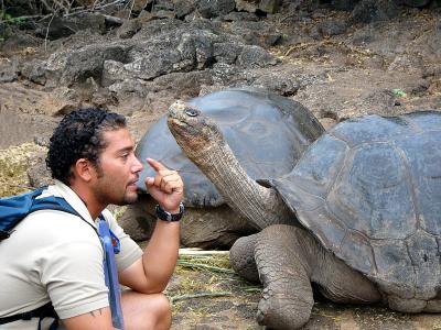 005 Julian (our guide) with giant tortoises.jpg