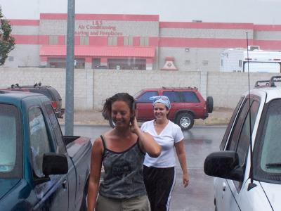 u46/candreae/medium/33926422.BridgetteandKimenjoyingtherainoutsideatthefieldoff.jpg